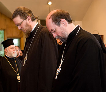 Fathers John Behr and Chad Hatfield