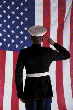Soldier saluting flag